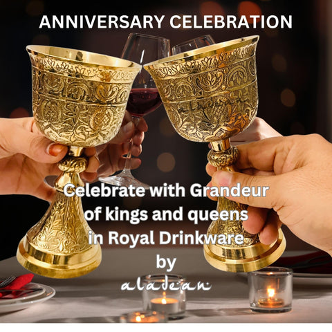 ALADEAN chalice held in a toast at a rustic table demonstrating ceremonial use