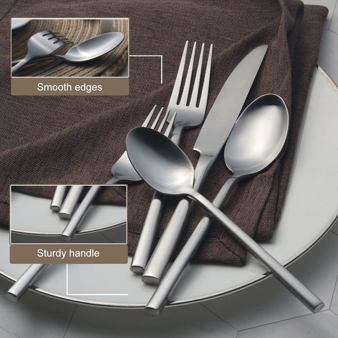 Alata flatware set arranged on dining table showing elegant coordination