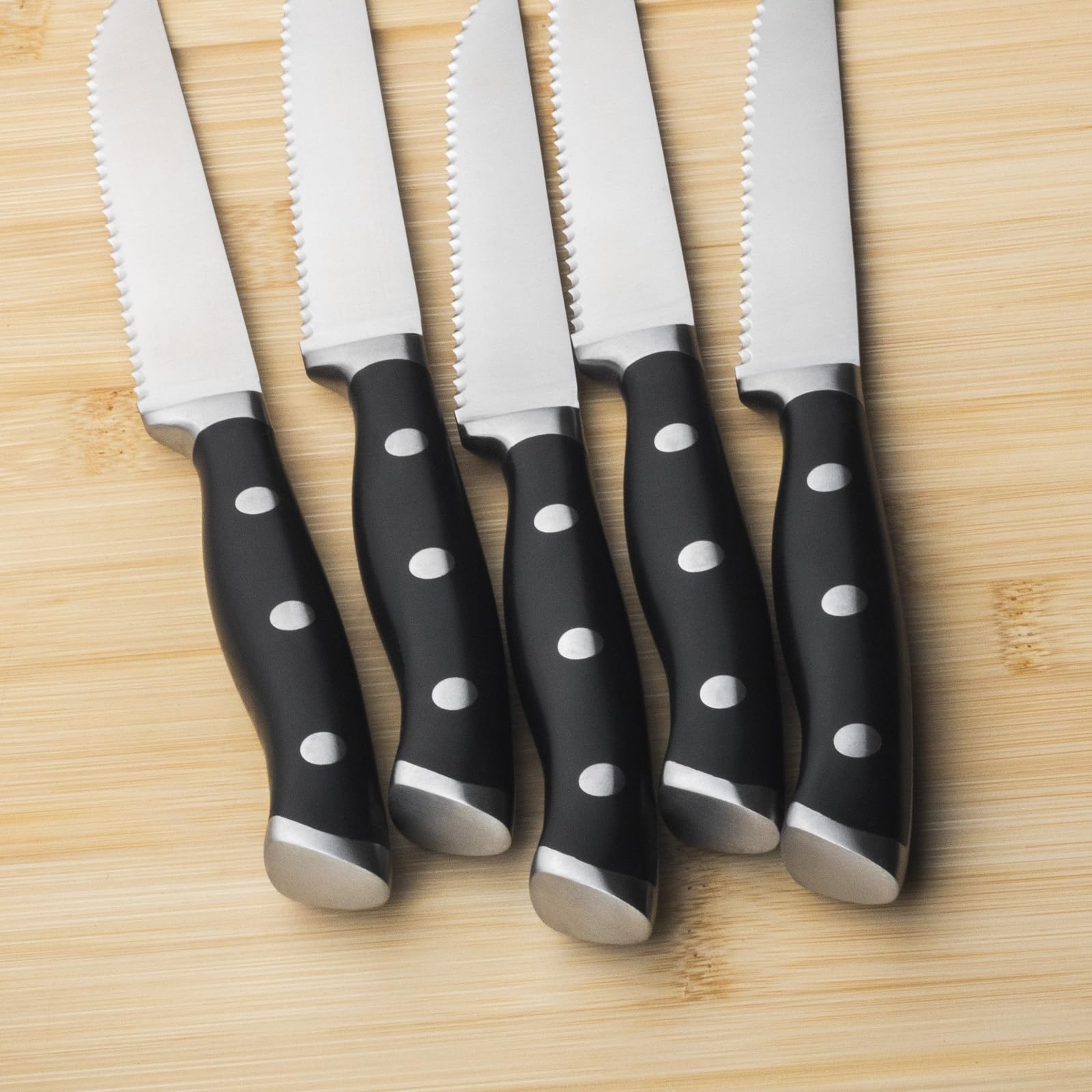 Alata handle detail highlighting triple-riveted ergonomic grip and balance