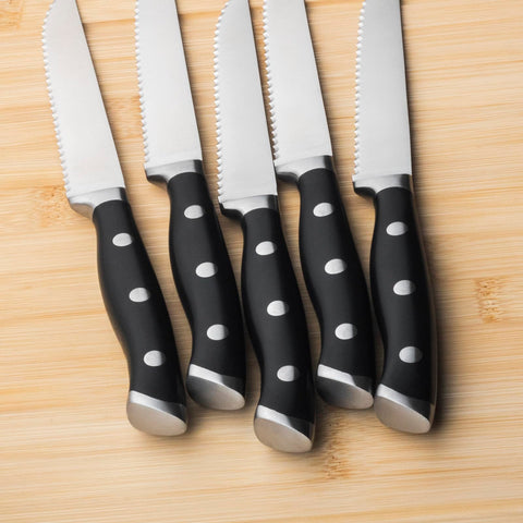 Alata handle detail highlighting triple-riveted ergonomic grip and balance