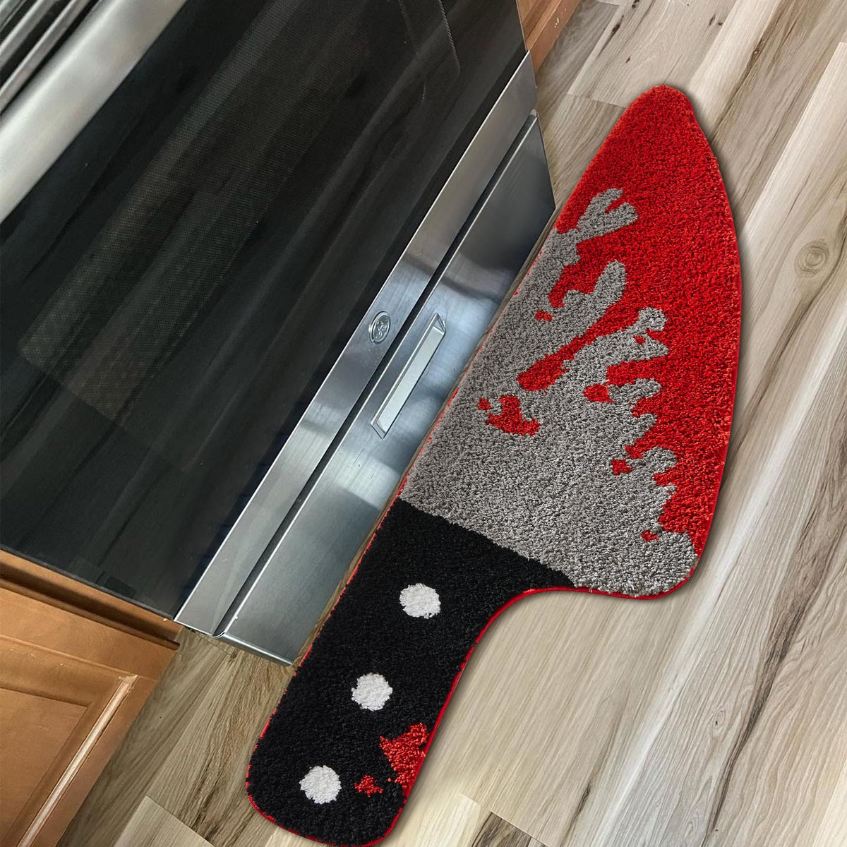 Aldopein front view of rug showing skull knife design and compact shape for dramatic entryways