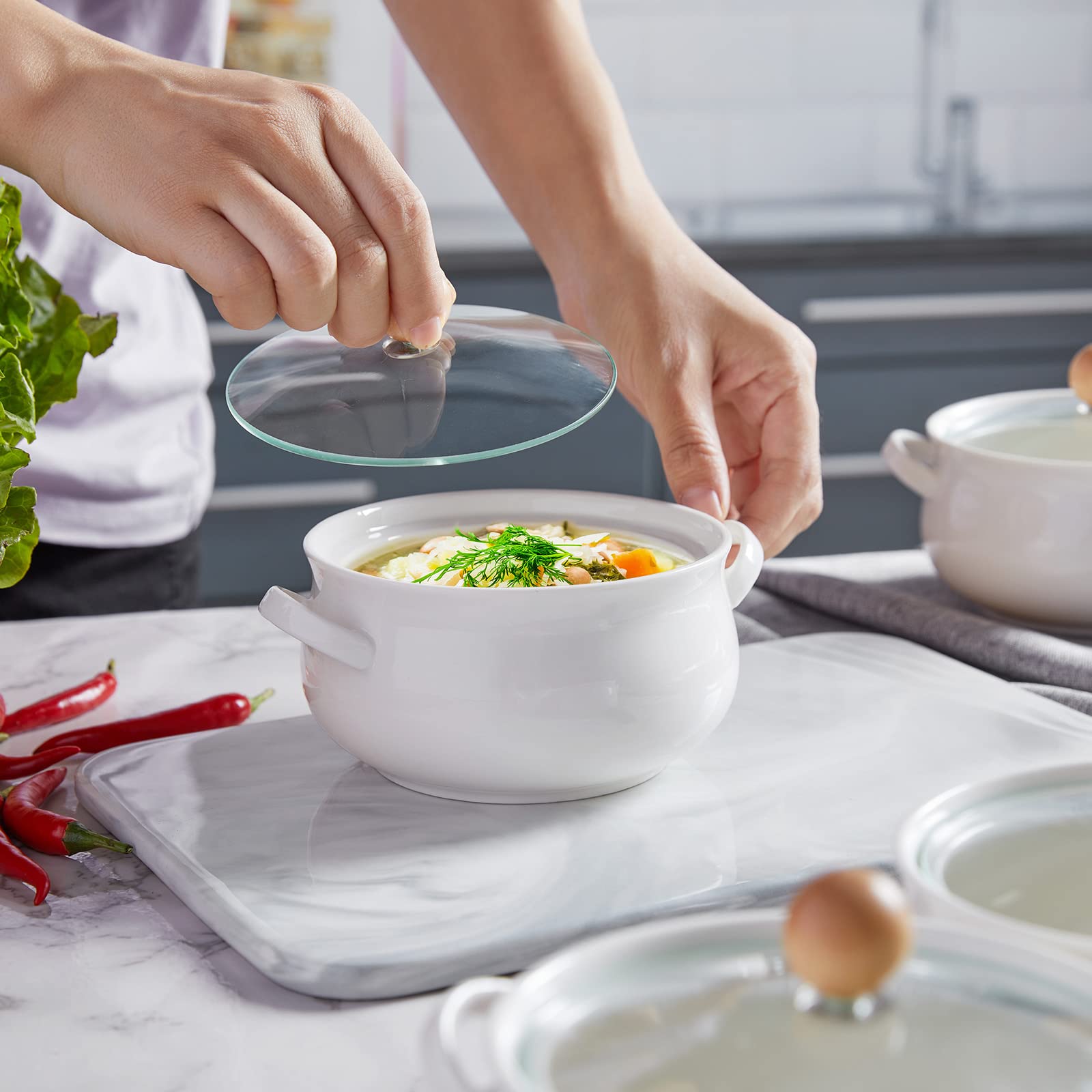ALELION filled with French onion soup topped with melted cheese, oven-to-table convenience