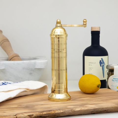 Alexander Home brass mill top cap detail showing access point and easy assembly benefit