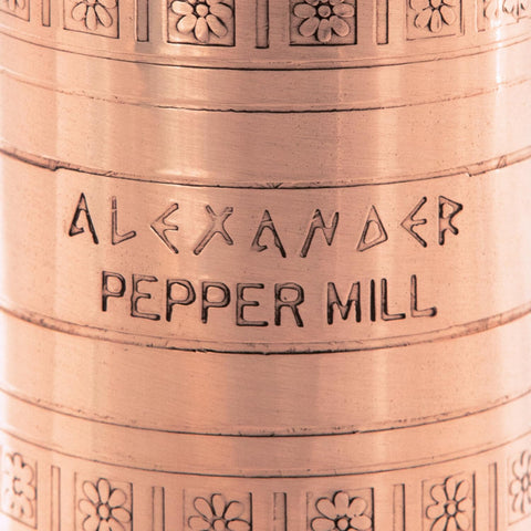 Alexander Home pepper mill open top showing internal handle storage and easy-assembly benefit