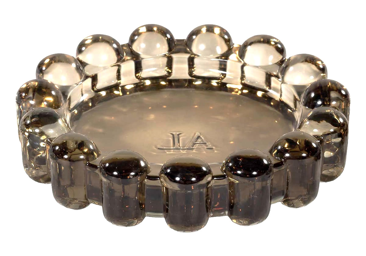 Alice Lane amber bubble dish front view highlighting elegant silhouette and visual warmth
