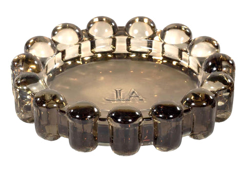 Alice Lane amber bubble dish front view highlighting elegant silhouette and visual warmth