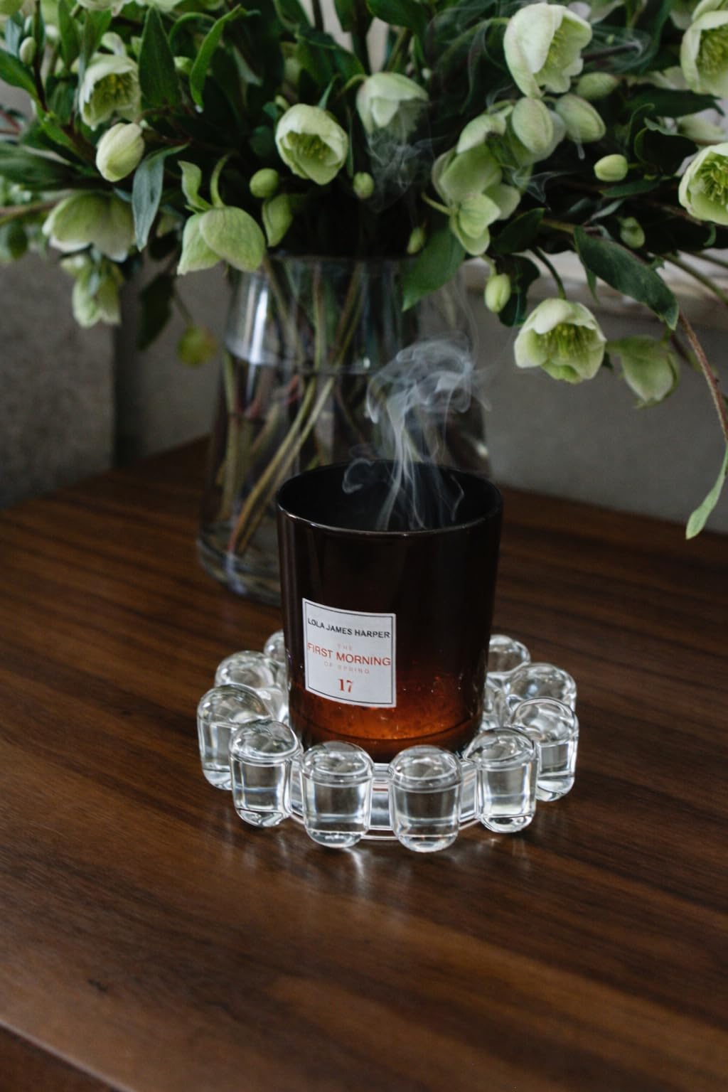 Alice Lane clear bubble dish on vanity styled with perfume and tray accents