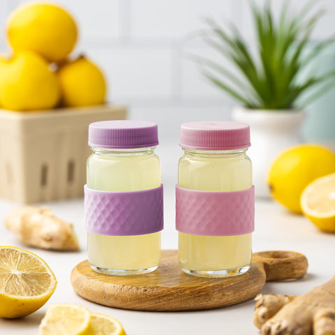 All About Juicing bottle in dishwasher rack demonstrating easy sanitation and reuse