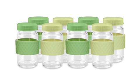 All About Juicing front view of eight clear glass shot bottles with caps, shows organized set