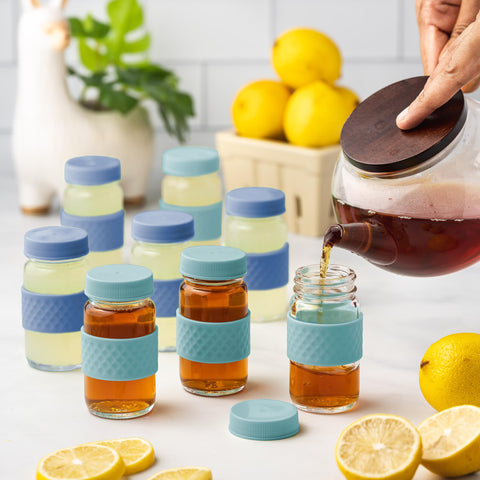 All About Juicing bottles on breakfast table showing travel-ready convenience