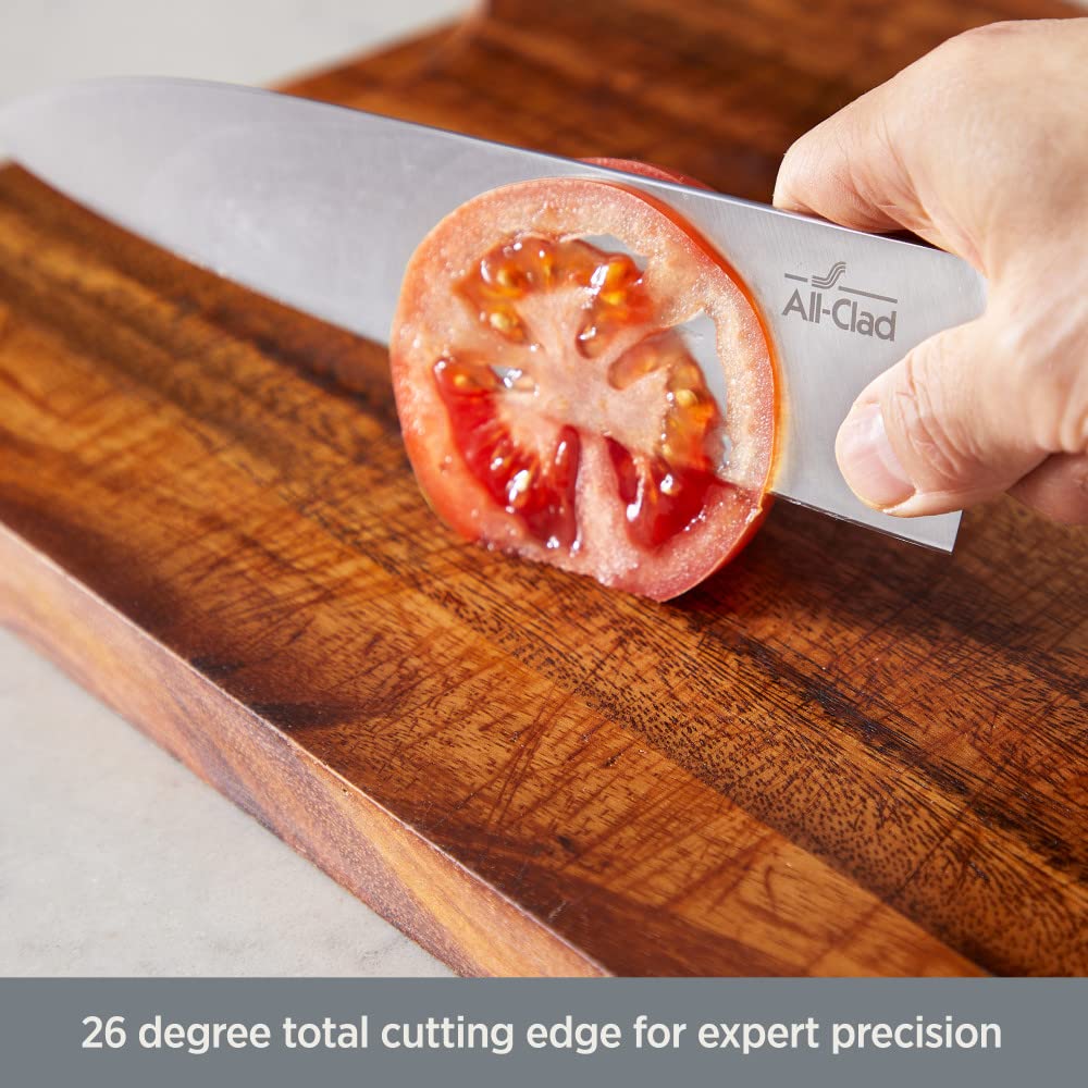 All-Clad chef knife chopping vegetables demonstrating balanced control and precision
