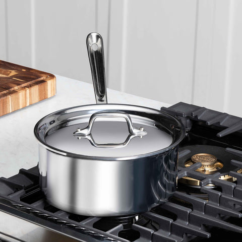All-Clad D3 pouring action demonstrating flared rim for drip-free transfer benefit
