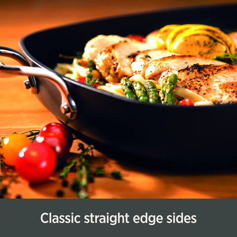All‑Clad double‑riveted handle showing secure grip for safe transfers