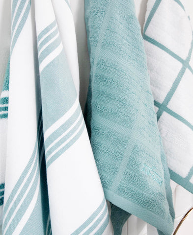 All-Clad towel used under a large pan as drying mat for protection benefit