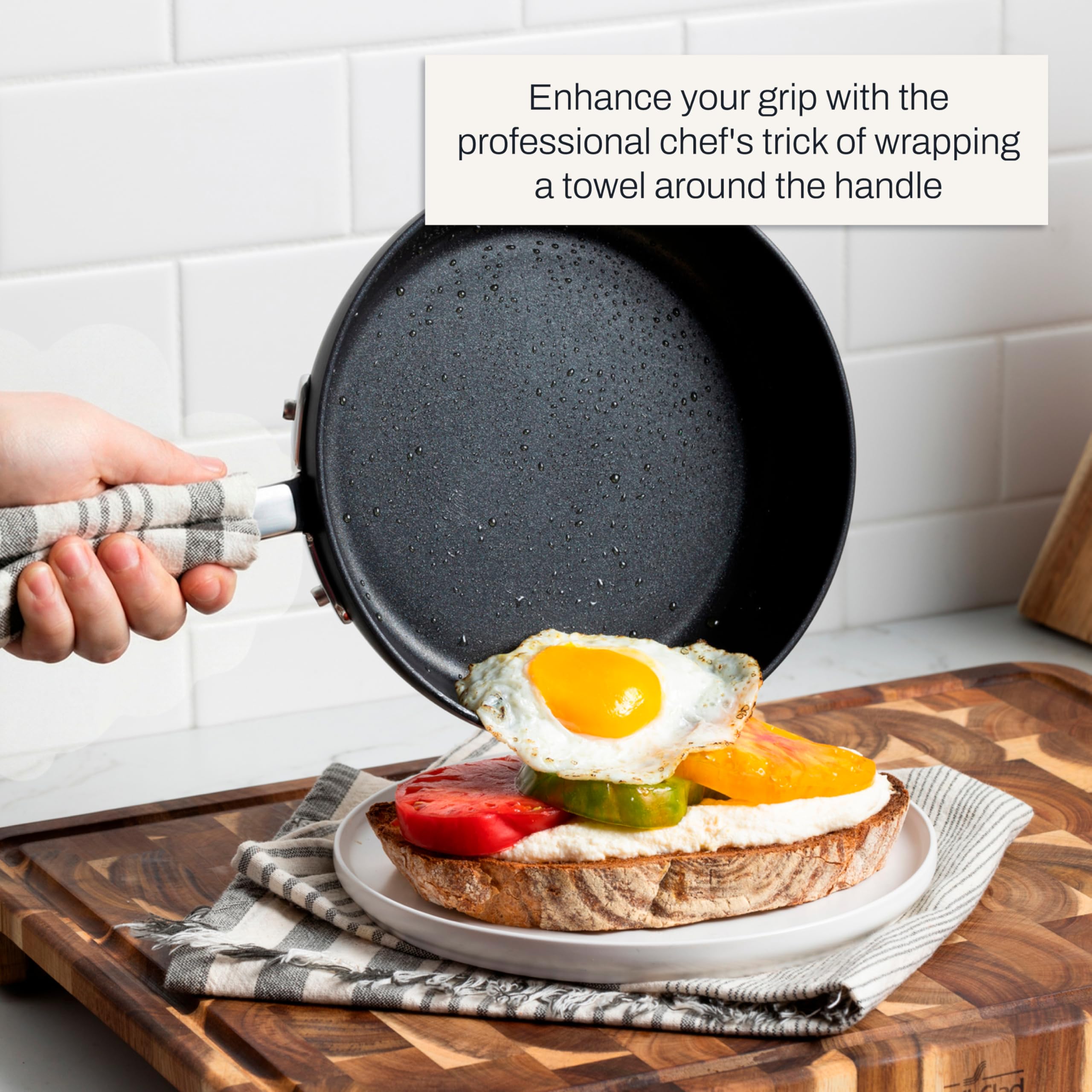 All-Clad HA1 10-inch pan sautéing vegetables demonstrating quick, even browning