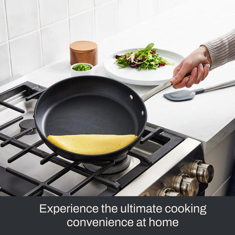 All-Clad side profile highlighting flared walls for easy flipping and sautéing