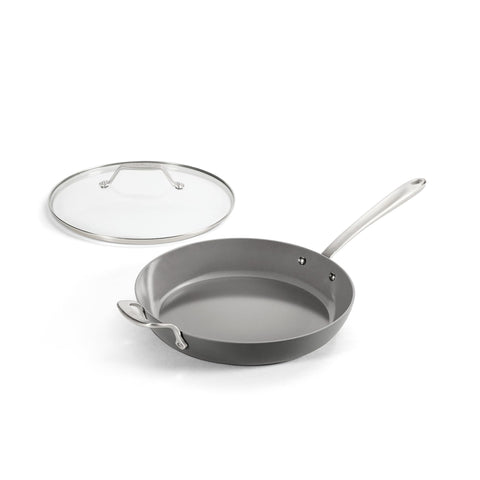 All-Clad HA1 front view with lid showing induction-ready base and practical lid benefit