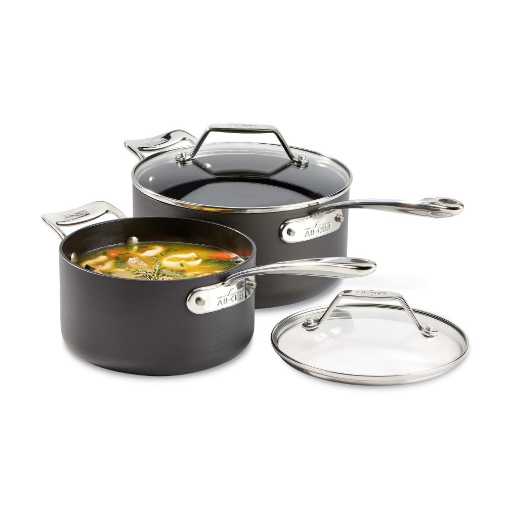 All‑Clad HA1 front view of both saucepans showing lids and finish for versatility