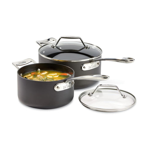 All‑Clad HA1 front view of both saucepans showing lids and finish for versatility