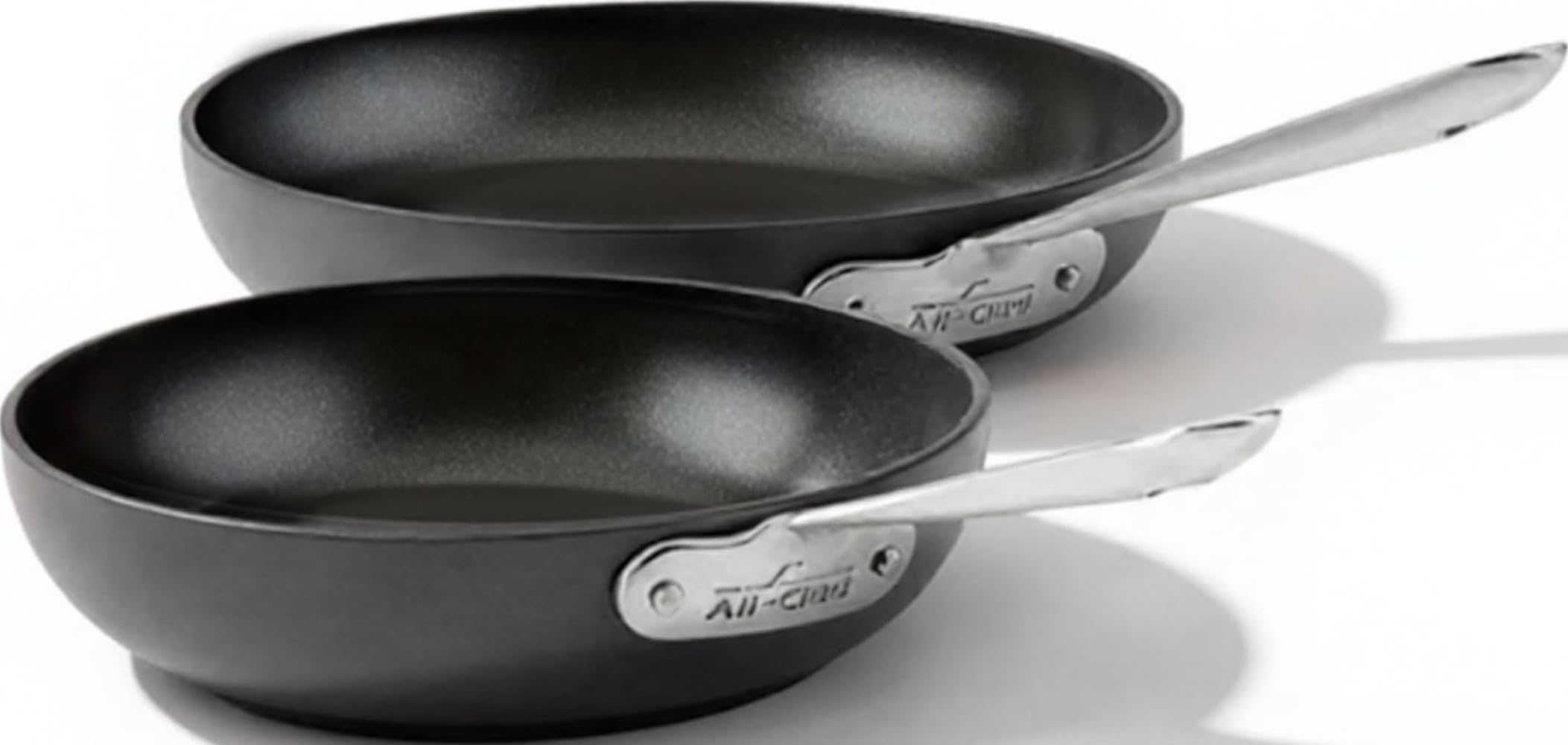 All-Clad HA1 front view set showing both pans and sleek exterior benefit even cooking