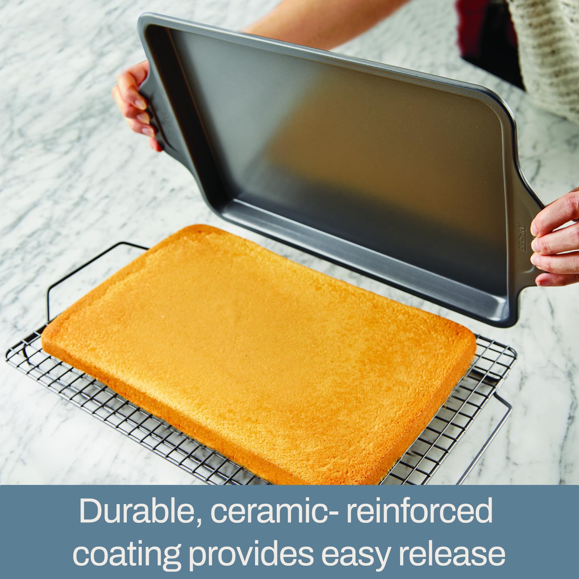 All-Clad integrated handle detail with oven mitt grip, safer lifting benefit