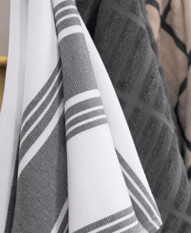 All-Clad hanging loop on a towel hung from a hook for quick access while cooking