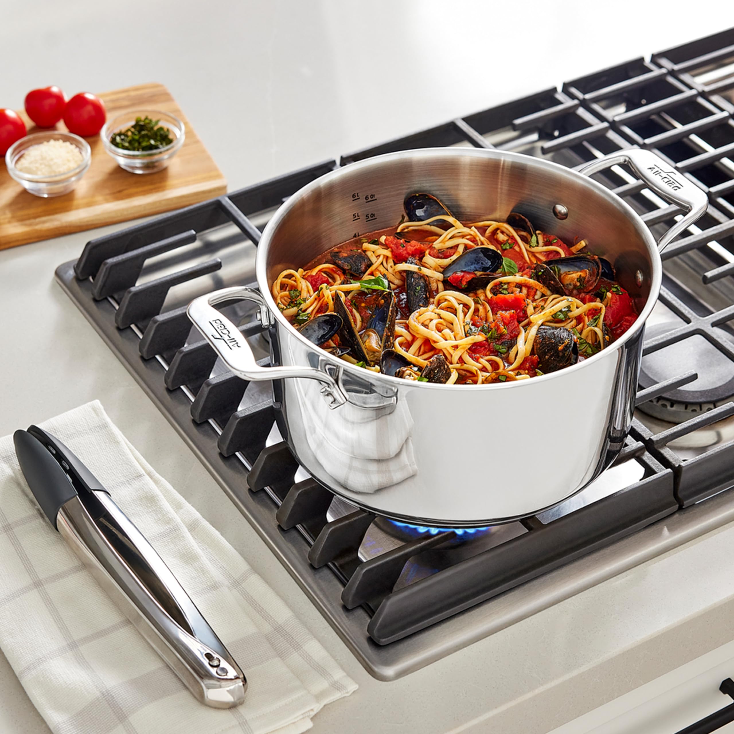 All-Clad insert close-up showing perforated base and large holes for easy draining