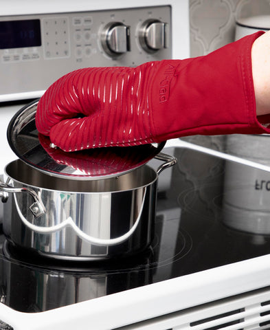 All-Clad mitt showing extended forearm coverage protecting wrists from heat