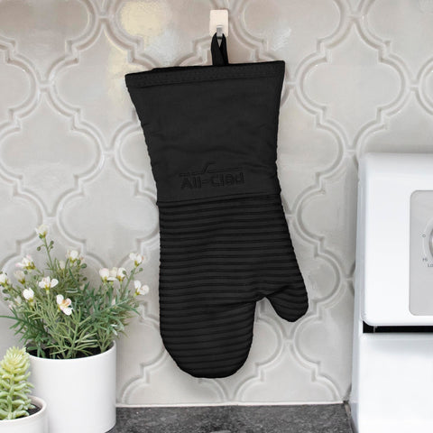 All-Clad mitts hanging by loop for easy storage and quick kitchen access