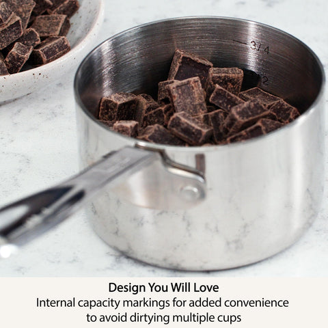 All-Clad scooping flour from a bag demonstrating easy reach and accuracy