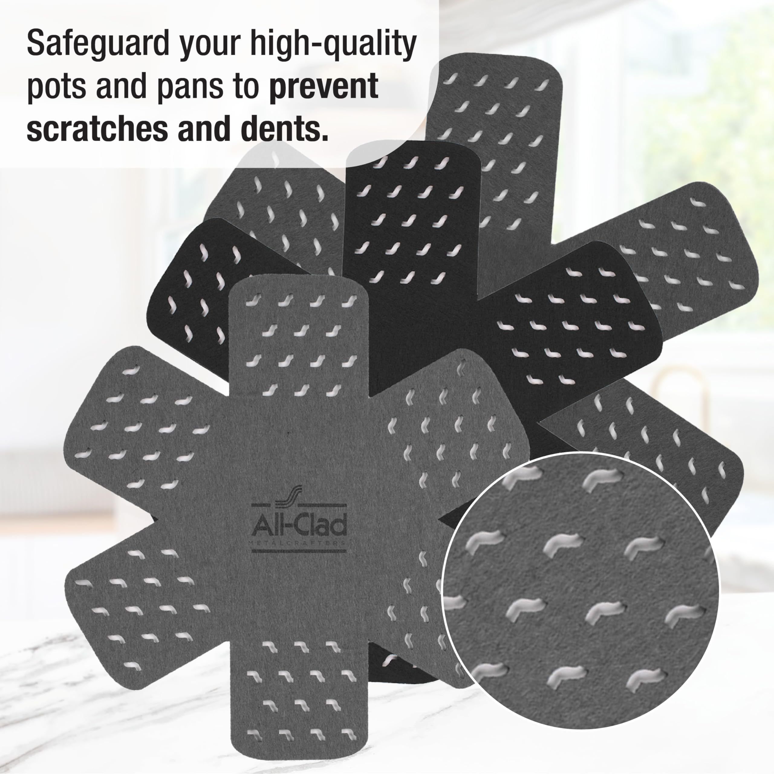 All-Clad silicone handle grip on skillet delivering secure, heat-resistant hold