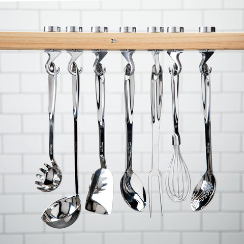 All-Clad spoon hanging on rack for easy storage and compact kitchen convenience