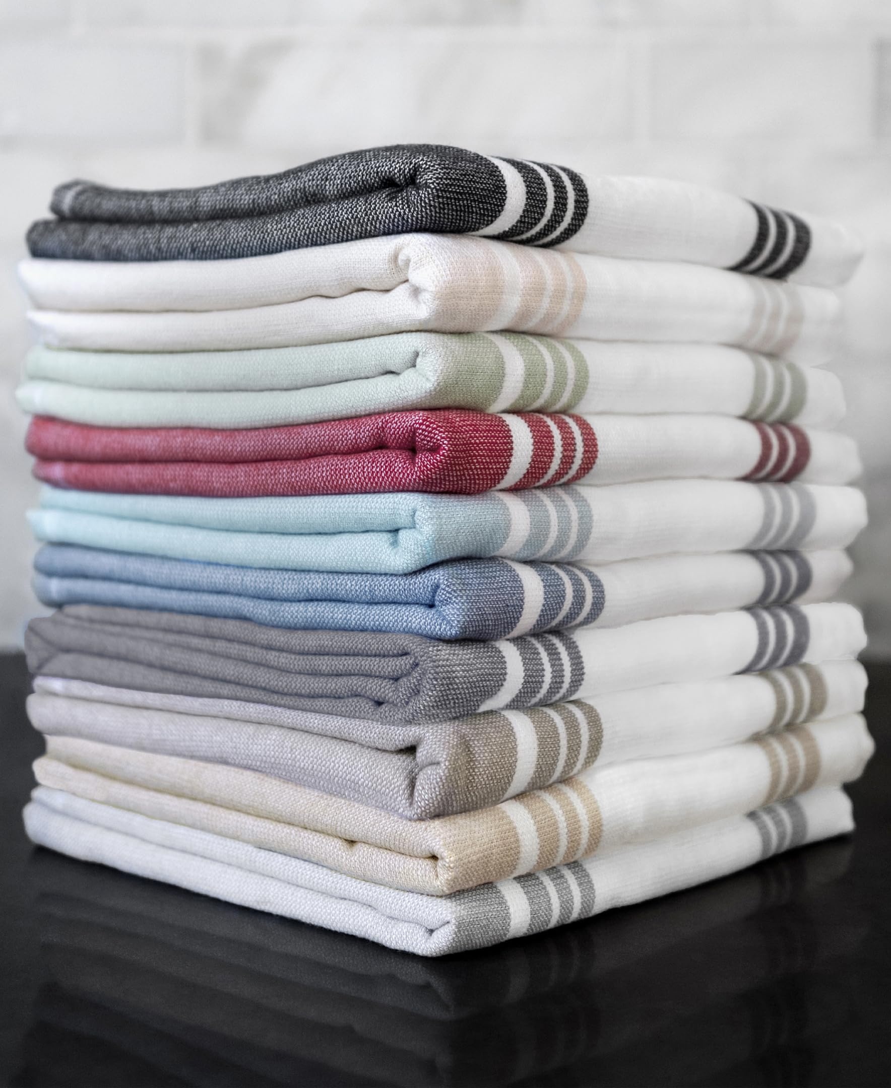 All-Clad stacked towels beside ruler showing oversized 17x30 benefit