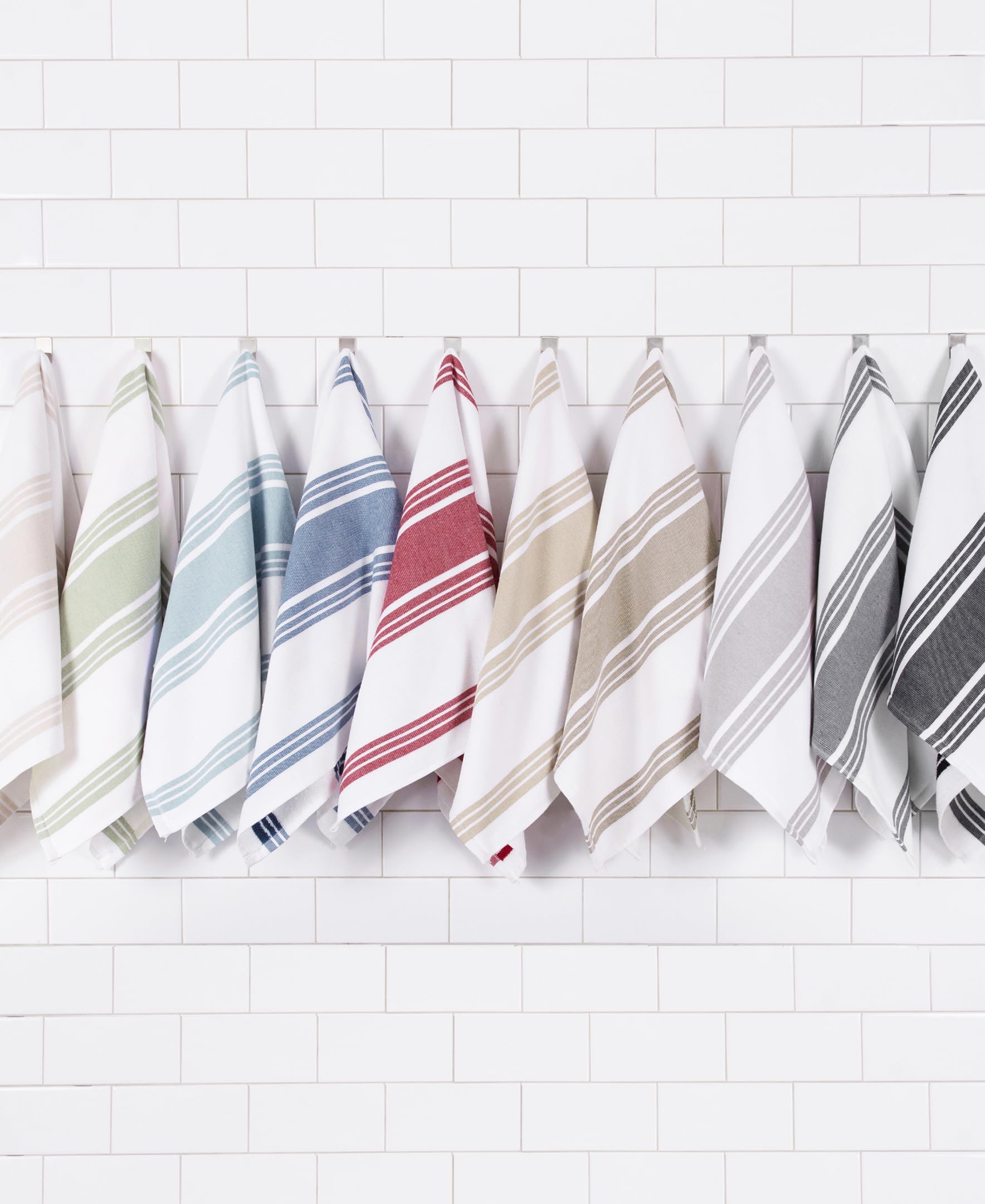 All-Clad towels styled on kitchen counter coordinating with cookware benefit