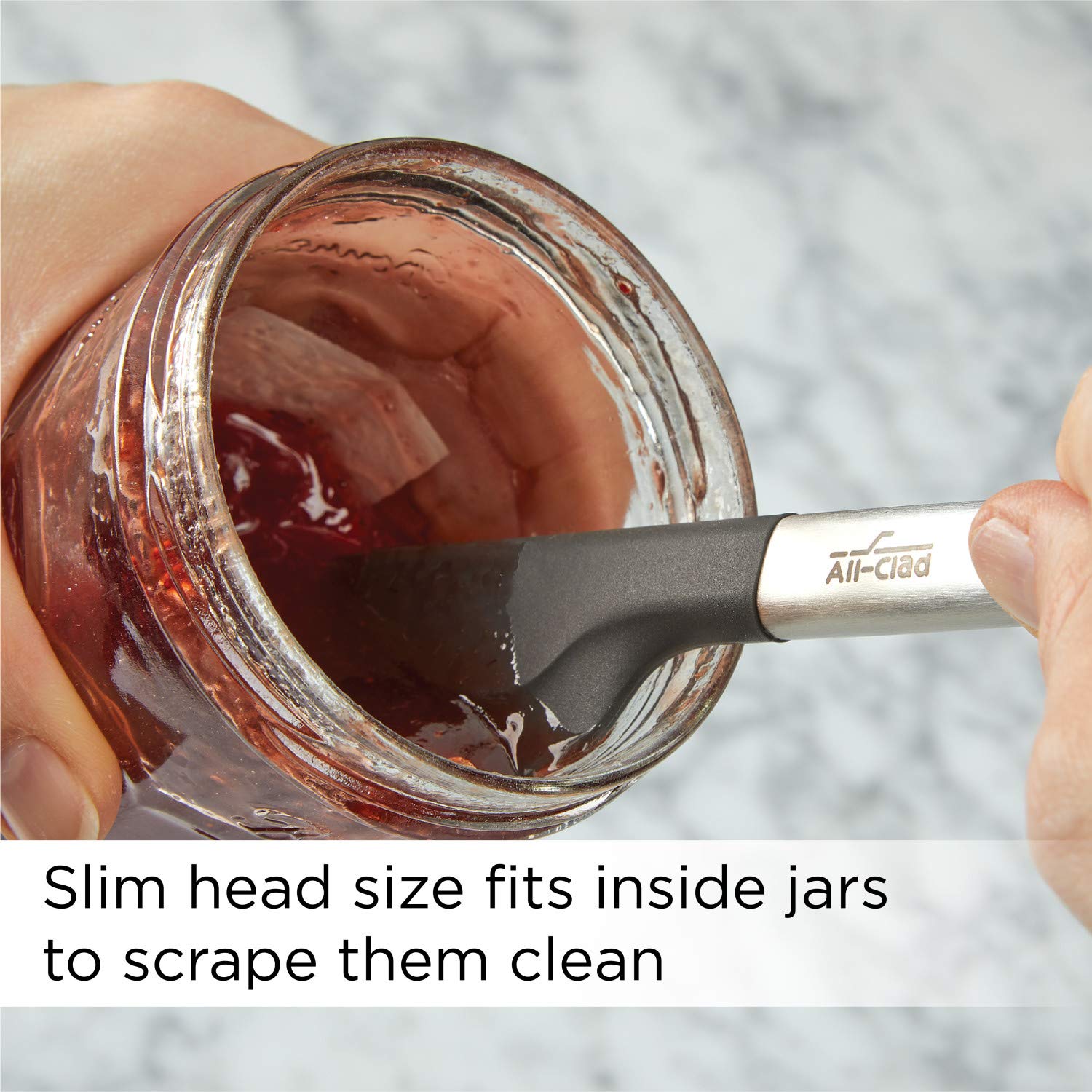 All-Clad tools in pan action shot benefit: safe on nonstick cookware at moderate heat