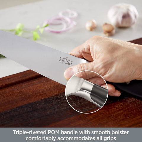 All-Clad utility knife slicing fruit for clean cuts and versatile household use