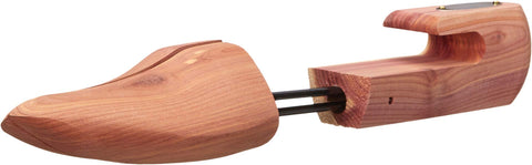 Allen Edmonds shoe tree next to ruler illustrating large size and proper scale