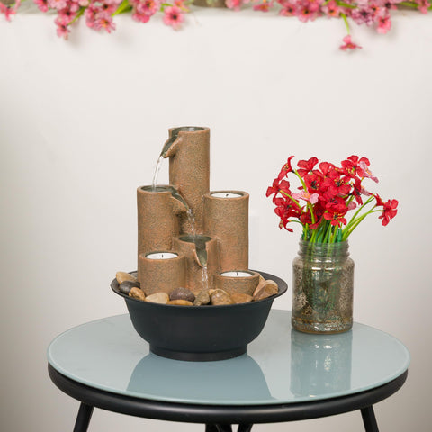 Alpine Corporation tealight holders detail showing safe candle placement and warm glow