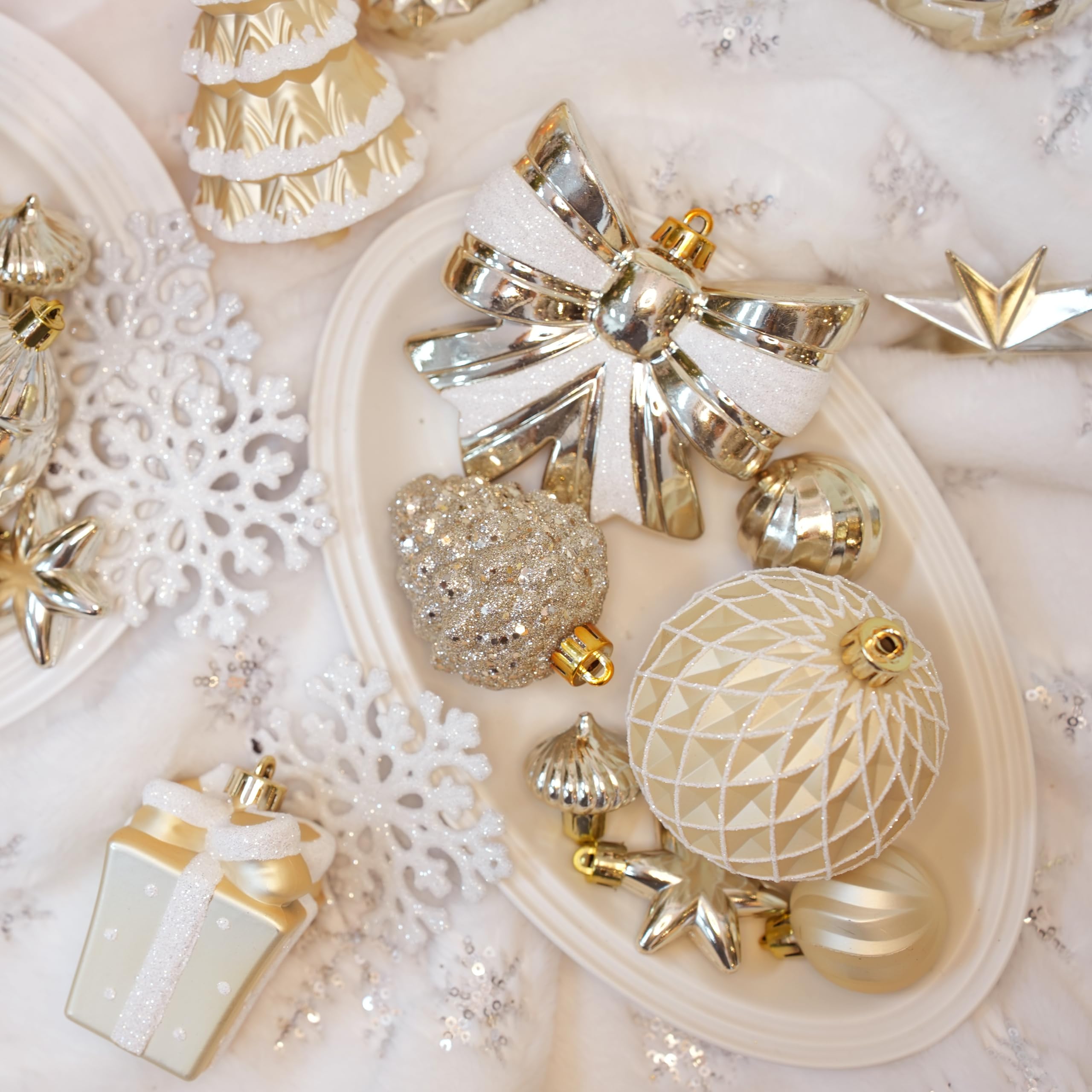 Alupssuc ornaments hung on a Christmas tree creating cohesive, festive ambiance
