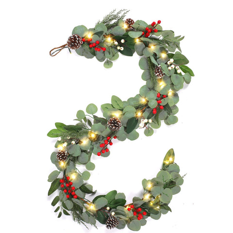 Alupssuc garland held for scale, shows realistic size and easy handling