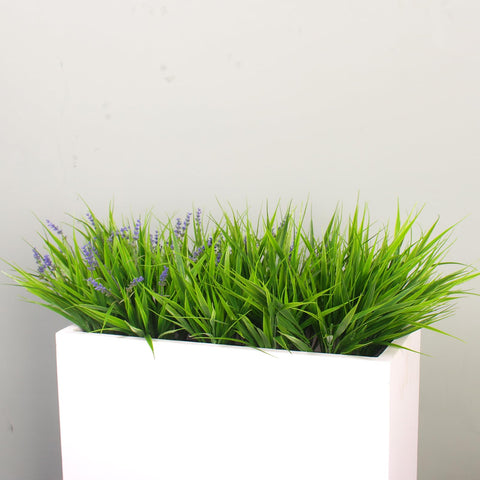alyptus wedding centerpiece with vibrant purple accents for events