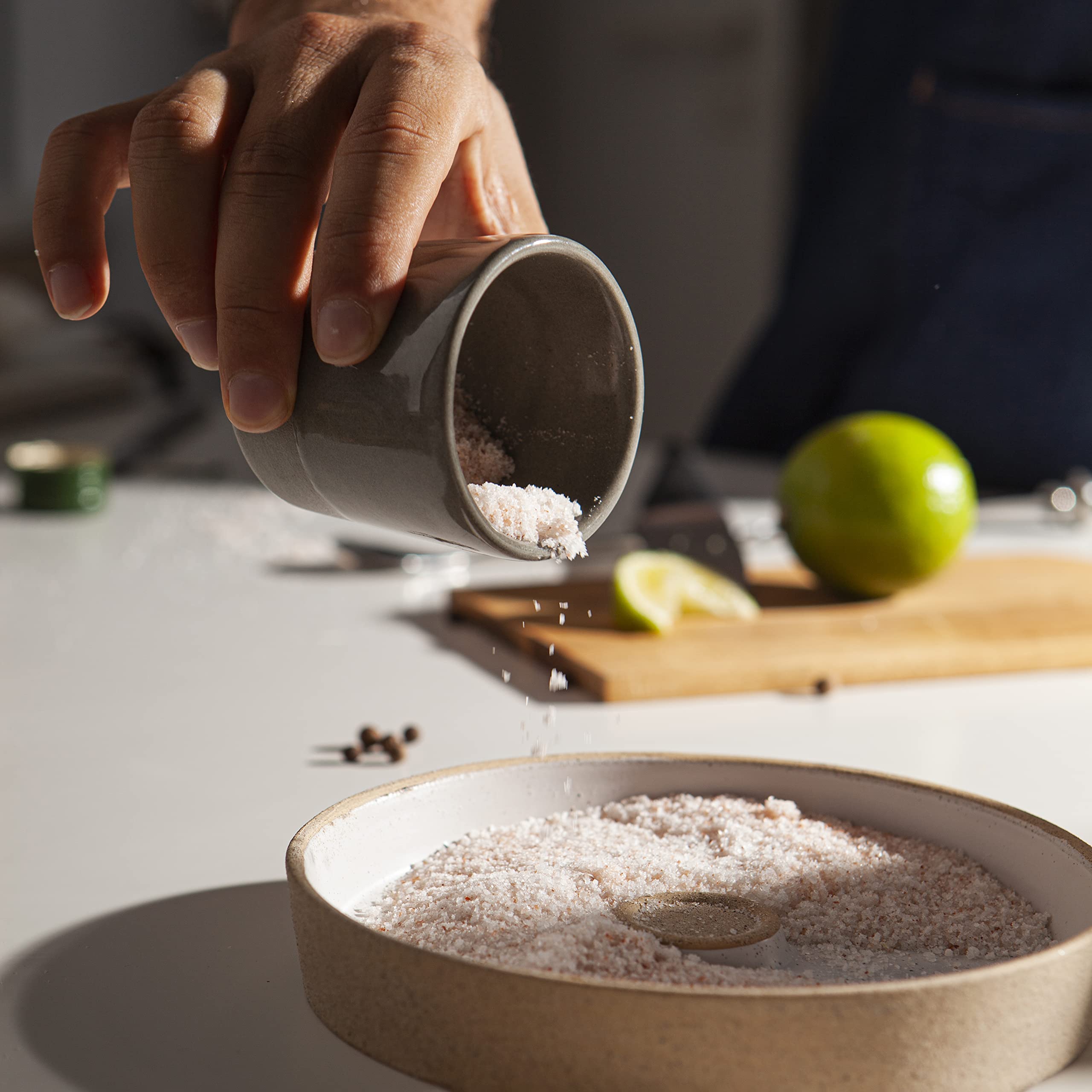Amarcado rimmer filled with tajín salt and sugar to show versatile garnish options