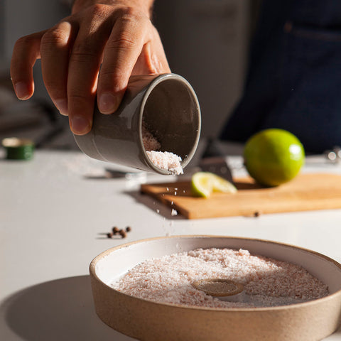 Amarcado rimmer filled with tajín salt and sugar to show versatile garnish options