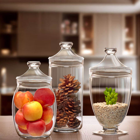 Amazing Abby jars on a bathroom vanity holding cotton pads and bath salts neatly