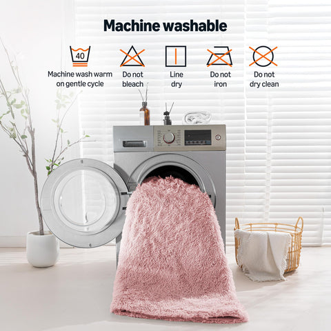 Amazon Basics care label and washing depiction showing easy machine-wash benefit