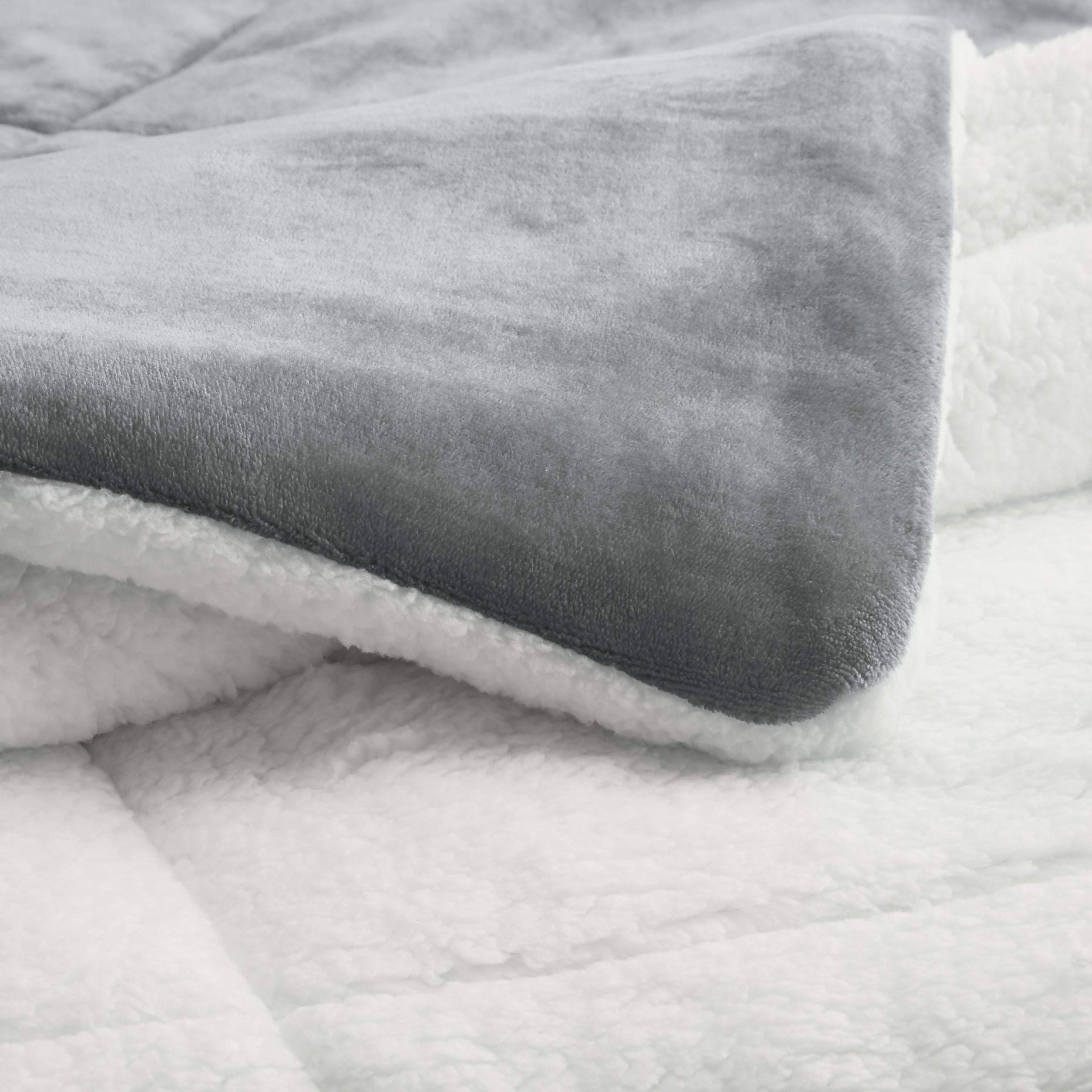 Amazon Basics comforter on styled king bed illustrating cozy bedroom presentation and fit