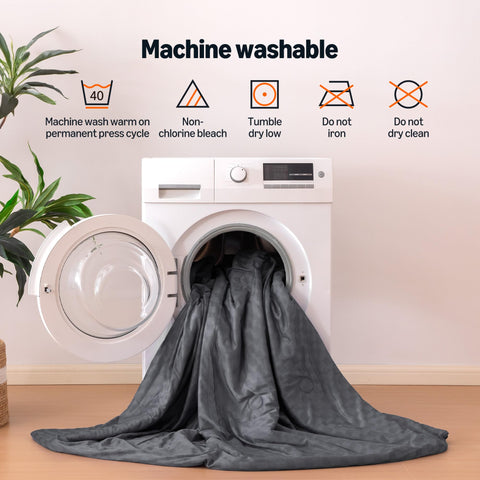 Amazon Basics comforter folded inside mesh laundry bag for easy machine care