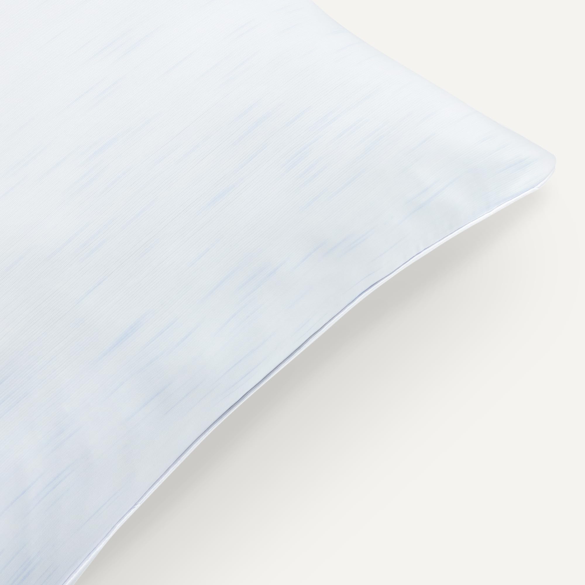 Amazon Basics macro view of hypoallergenic down-alternative fill showing supportive texture