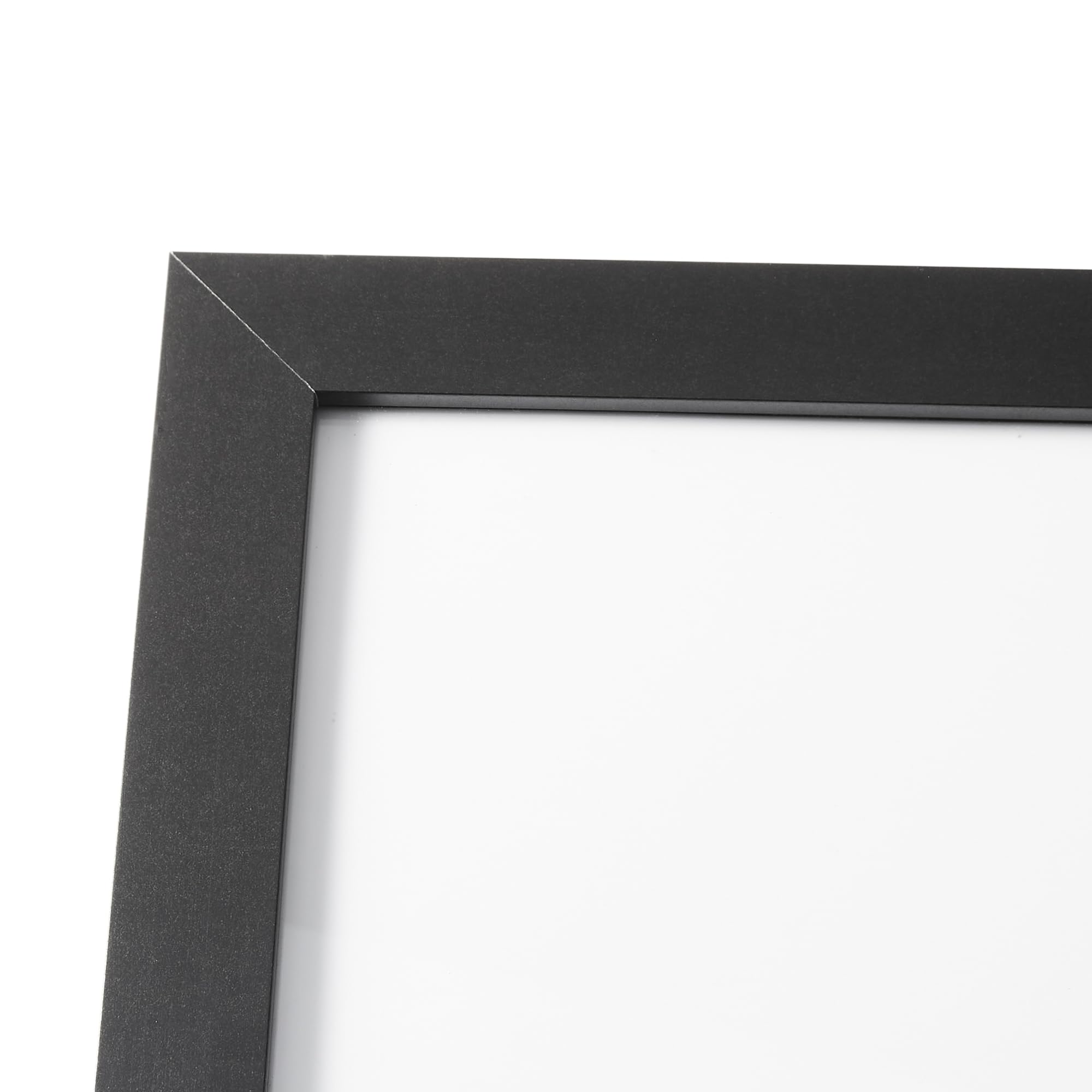 Amazon Basics frame on living room wall displaying poster and enhancing decor