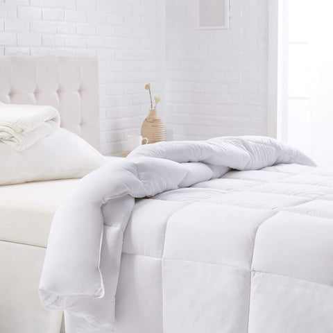 Amazon Basics front packaging of twin comforter shows neat fold and benefit of easy storage
